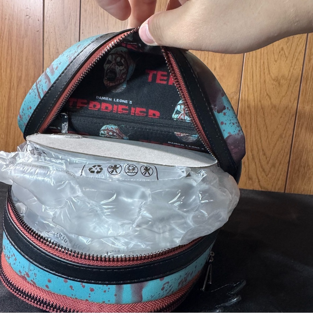 Loungefly Terrifier Art the Clown Glow in the Dark Mini Backpack EE Exclusive - Picture 8 of 8
